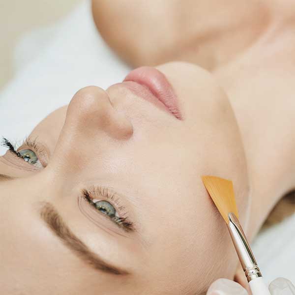 Woman getting skin treatment at a clinic